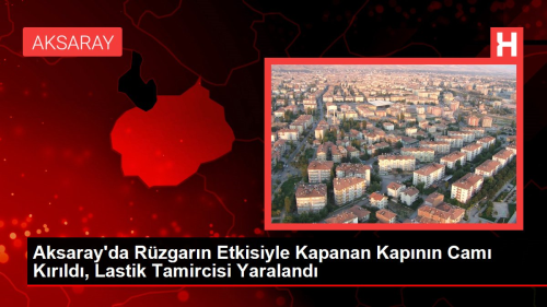 Aksaray'da Rzgarn Etkisiyle Kapanan Kapnn Cam Krld, Lastik Tamircisi Yaraland