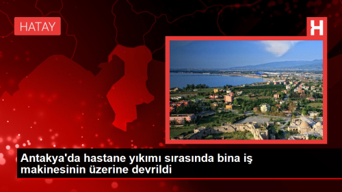 Antakya'da zel hastanenin ykm srasnda bina i makinesinin zerine devrildi