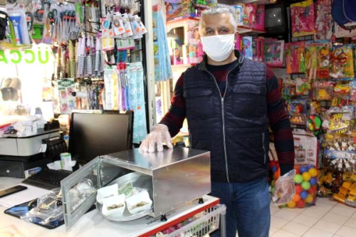 Antalyal esnaf, koronavirse kar madeni paralar frnda dezenfekte ediyor