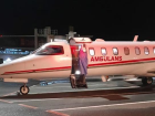 Liberya'da �al���rken s�tma te�hisi konan �zmirli Ersin Akan, ambulans u�akla T�rkiye'ye getirildi
